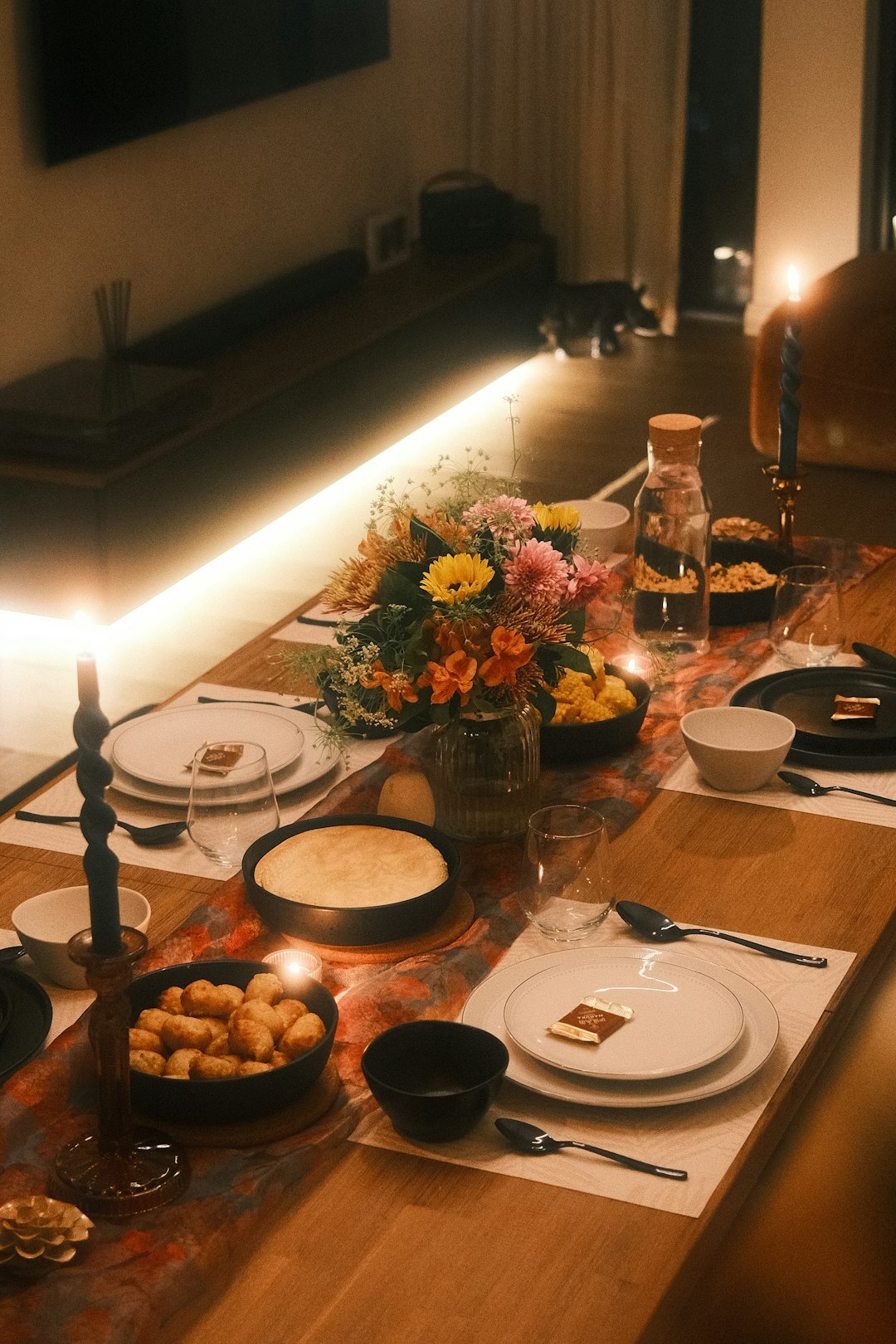 Traditional Czech Sunday dinner table with svíčková and dumplings