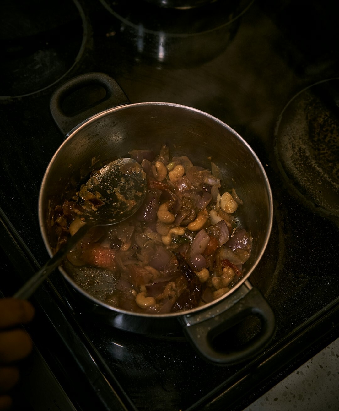cooking fruit jam in pot